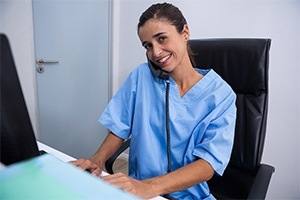 Dental team member on phone