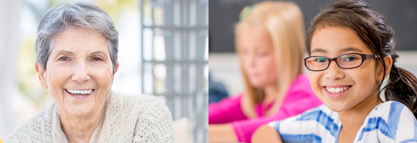Senior woman smiling on the left and young girl smiling on the right