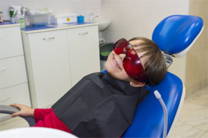 Boy with dental glasses