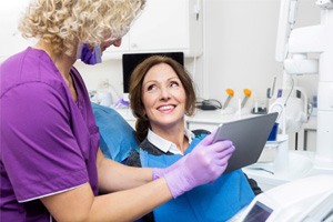 a patient consulting with a dentist