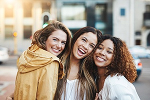 three friends hanging out together