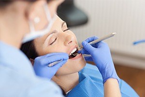 Relaxed patient receiving dental exam