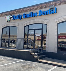 Exterior of Daily Smiles Dental office building in Dallas